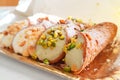 Sicilian cannoli on a tray, delicious Italian food made of ricotta and pistachio grains Royalty Free Stock Photo