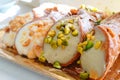 Sicilian cannoli on a tray, delicious Italian food made of ricotta and pistachio grains Royalty Free Stock Photo