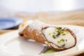 Sicilian cannolo with filling of ricotta cream Royalty Free Stock Photo