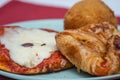 Sicilian Cartocciata, Pizzetta, Cipollina and Arancino. A typical street food from Sicily