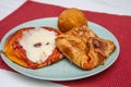 Sicilian Cartocciata, Pizzetta, Cipollina and Arancino. A typical street food from Sicily