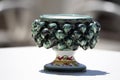 Sicilian ceramic cup of caltagirone town on a table