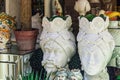 Sicilian ceramic decorative Moorish heads vases on display, depicting the faces of a man and a woman at a shop window showcase in Royalty Free Stock Photo