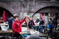 Sicilian fisherman shows an octopus in the fish market of Catania Royalty Free Stock Photo
