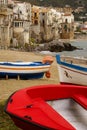 Sicilian fishing boat on the beach in Cefalu, Sicily Royalty Free Stock Photo