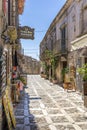 Sicilian souvenirs. Ancient, typical narrow and cobblestone street in Erice, Sicily, Italy