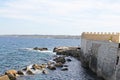Sicily, coast, sea and coastal wall with the rocks Royalty Free Stock Photo