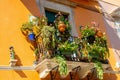 Sicily, Taormina, Italy - 28 September 2023. A beautifully decorated balcony on a townhouse in the main street Corso umberto in