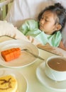 Sick Asian Child Hospital Patient on Bed with Breakfast Meal Menu