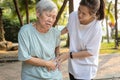 Sick asian senior woman with belly pain,elderly have severe stomach ache,left side,patient with acute pancreatitis hold hand left Royalty Free Stock Photo