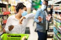 Sick Black Lady In Mask Coughing Buying Grocery In Supermarket