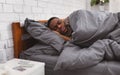 Sick Black Man Sleeping In Bed Having Flu At Home Royalty Free Stock Photo