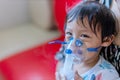 Sick boy inhalation therapy by the mask of inhaler. Baby has asthma and need nebulizations Royalty Free Stock Photo