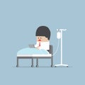 Sick businessman working hard in hospital bed Royalty Free Stock Photo