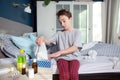 Sick child boy lying in bed with a fever, resting Royalty Free Stock Photo