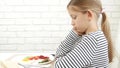 Sick Child Couldn`t Eat Breakfast in Kitchen, Sad Kid not Eating, Girl Looking Food Meal No Appetite, Children Healthcare