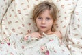 Sick child measures the temperature Royalty Free Stock Photo