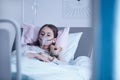 Sick child with oxygen mask Royalty Free Stock Photo