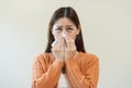 Sick, Coronavirus covid asian young woman, girl have a fever, flu, hand in use tissues paper sneezing nose, runny and cough,