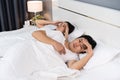 Sick couple headache and suffering from virus disease and fever on bed Royalty Free Stock Photo