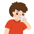 Sick cute boy with a cold and runny nose getting paper napkin sneezing. Royalty Free Stock Photo