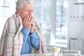 Sick elderly man with pills Royalty Free Stock Photo