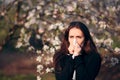 Sick Girl Blowing Her Nose Outdoors in Spring Season Royalty Free Stock Photo