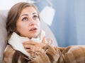 Sick girl with scarf on neck Royalty Free Stock Photo