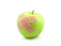 Sick green apple with patches Royalty Free Stock Photo