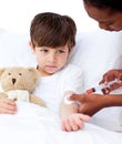 Sick little boy receiving an injection Royalty Free Stock Photo