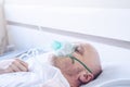 Sick man with breathing problem with oxygen mask or ventilato Royalty Free Stock Photo