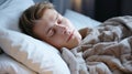 Sick man with cold sleeping in bed, space for text, healthcare concept, illness and rest, flu season Royalty Free Stock Photo