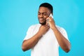 Sick Man Having Sore Throat Calling Doctor Over Blue Background Royalty Free Stock Photo