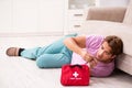 The sick man at home with first aid kit Royalty Free Stock Photo