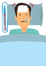 Sick man lying in bed with thermometer in mouth covered in blanket measuring temperature Royalty Free Stock Photo