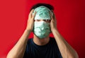 Sick man with mask touch head, fear virus Infect