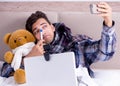 The sick man suffering from flu in the bed Royalty Free Stock Photo