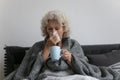 Sick mature senior woman suffering from flu, cold Royalty Free Stock Photo