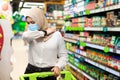 Sick Muslim Lady Coughing In Elbow Buying Food In Supermarket