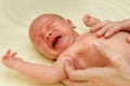 Sick newborn child with alergy rash is weeping