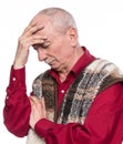 Sick old man. Senior man suffering from headache over white background Royalty Free Stock Photo