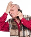 Sick old man. Senior man suffering from headache over white background