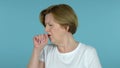 The Sick Old Woman Coughing Isolated on Blue Background