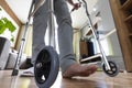 sick person walks with the help of special devices for rehabilitation. Walkers for adults. rehabilitation after a broken