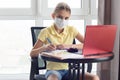 A sick quarantined girl remotely learns and looked in frame