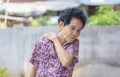 Sick senior adult elderly women touching the neck have shoulder and neck pain. Woman massaging her aching areas. Mature woman with Royalty Free Stock Photo