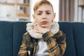 Sick teenage boy with high fever and sore throat and feeling bad Royalty Free Stock Photo