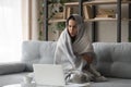 Sick woman feel cold at home covered with blanket Royalty Free Stock Photo