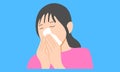 Sick woman ill suffering spring allergy using tissue on nose