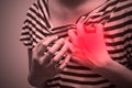 Sick woman with severe heartache, suffering from chest pain